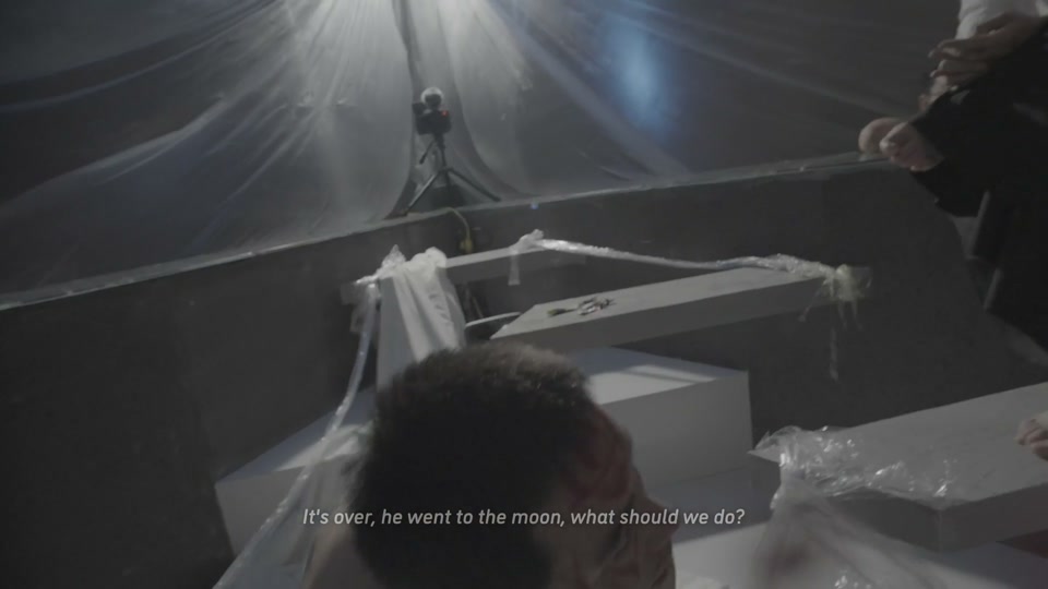 Film still at 2:03:18, Huang Meng: It's over. He's gone to the moon. What do we do?