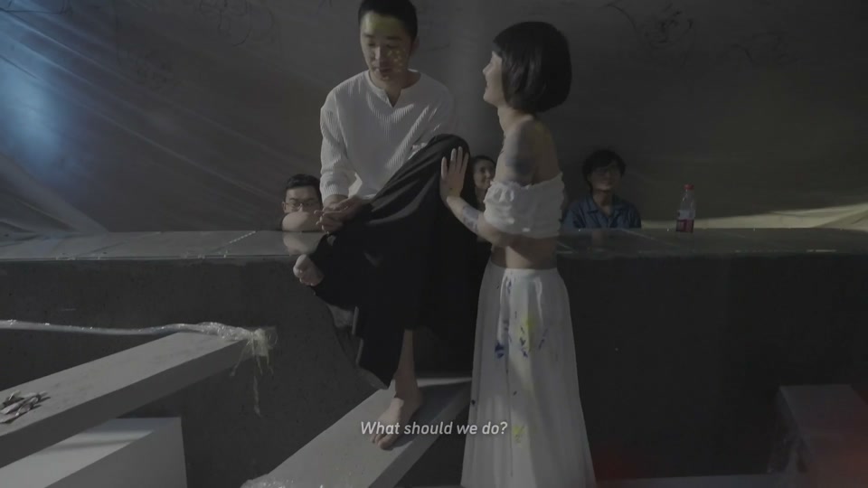 Film still at 2:03:24, Huang Meng: He will go to the moon ahead of time.